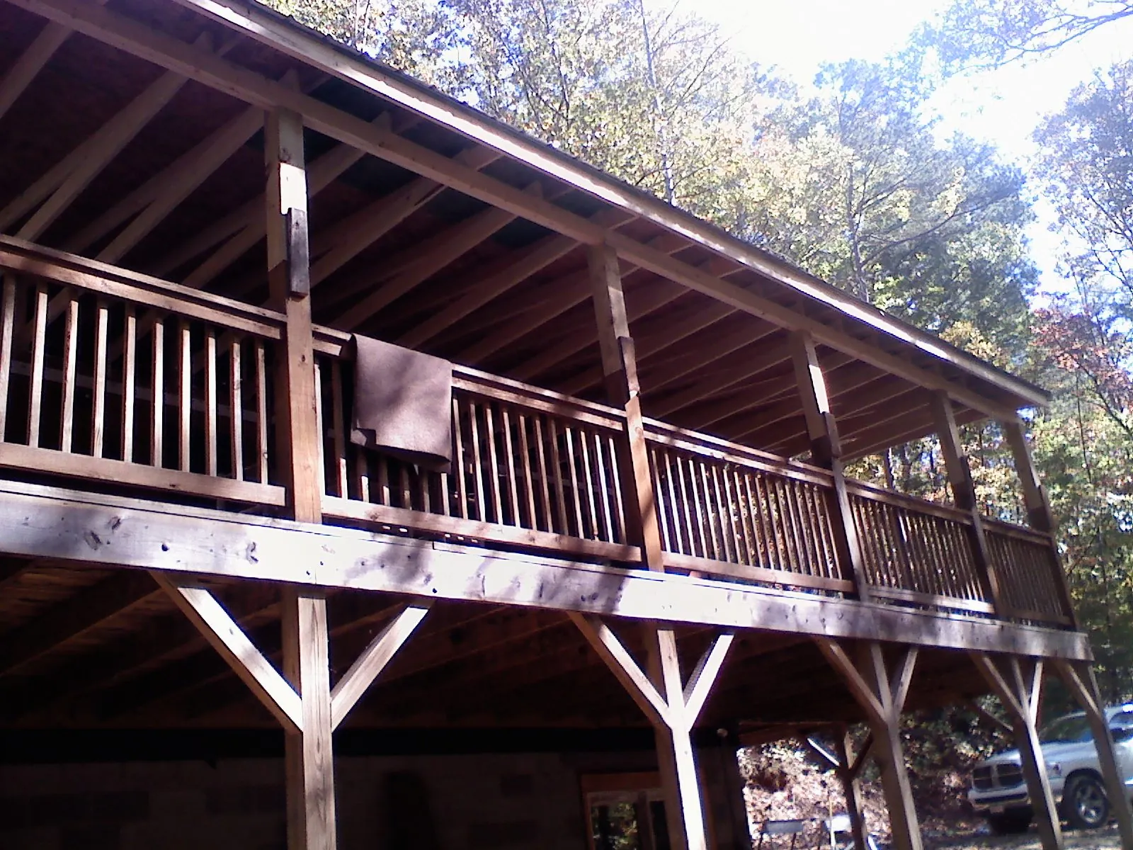 Timber framing under a new elevated porch and deck — Roof Leak Repair in Alkol by Roofing Brothers